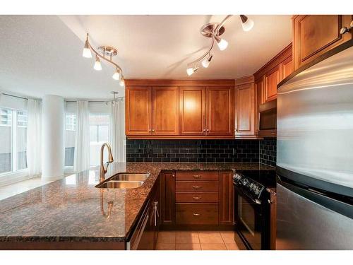 604-920 5 Avenue Sw, Calgary, AB - Indoor Photo Showing Kitchen With Double Sink