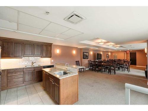 604-920 5 Avenue Sw, Calgary, AB - Indoor Photo Showing Kitchen With Double Sink