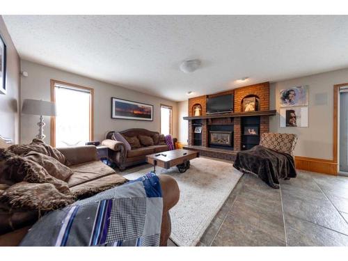 3801 57A Avenue, Lloydminster, AB - Indoor Photo Showing Living Room With Fireplace