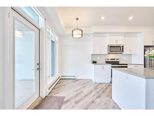 307-205 Spring Creek Common Sw, Calgary, AB - Indoor Photo Showing Kitchen