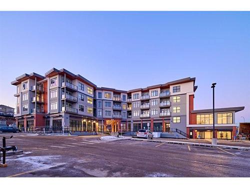 307-205 Spring Creek Common Sw, Calgary, AB - Outdoor With Balcony With Facade