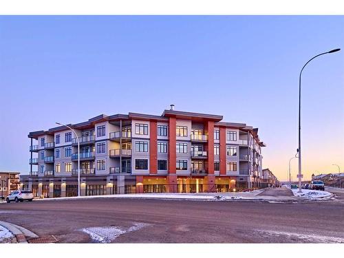 307-205 Spring Creek Common Sw, Calgary, AB - Outdoor With Balcony With Facade