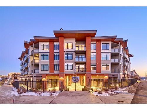 307-205 Spring Creek Common Sw, Calgary, AB - Outdoor With Balcony With Facade