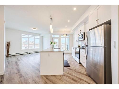 307-205 Spring Creek Common Sw, Calgary, AB - Indoor Photo Showing Kitchen