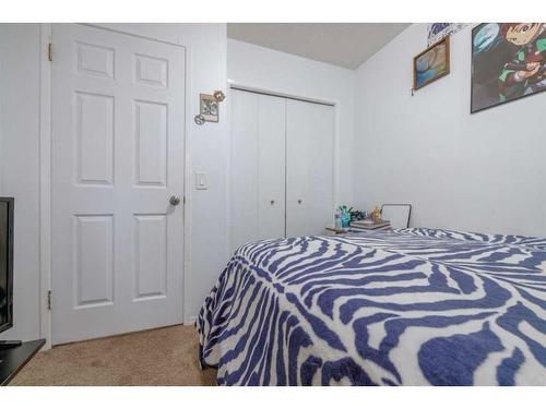 101-6103 Madigan Drive Ne, Calgary, AB - Indoor Photo Showing Bedroom