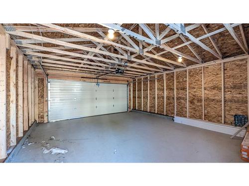 219 Midlawn Close Se, Calgary, AB - Indoor Photo Showing Garage