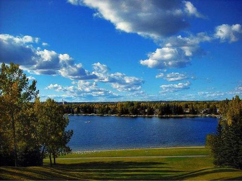 219 Midlawn Close Se, Calgary, AB - Outdoor With Body Of Water With View