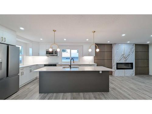 219 Midlawn Close Se, Calgary, AB - Indoor Photo Showing Kitchen With Stainless Steel Kitchen With Upgraded Kitchen