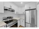 87-2511 38 Street Ne, Calgary, AB  - Indoor Photo Showing Kitchen With Stainless Steel Kitchen With Upgraded Kitchen 