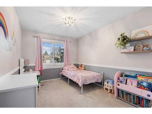 14427 Parkside Drive Se, Calgary, AB - Indoor Photo Showing Bedroom