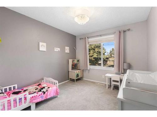 14427 Parkside Drive Se, Calgary, AB - Indoor Photo Showing Bedroom