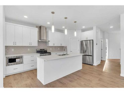 3171 Chinook Winds Drive Sw, Airdrie, AB - Indoor Photo Showing Kitchen With Upgraded Kitchen