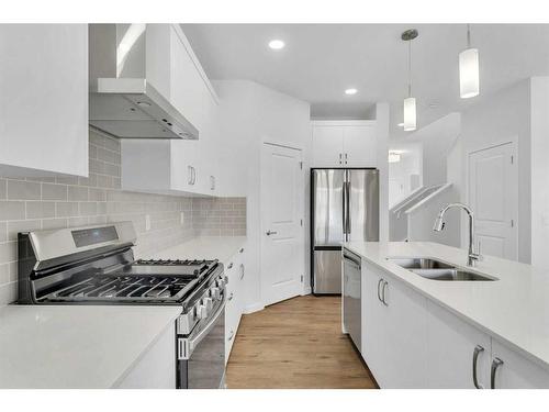 3171 Chinook Winds Drive Sw, Airdrie, AB - Indoor Photo Showing Kitchen With Stainless Steel Kitchen With Double Sink With Upgraded Kitchen