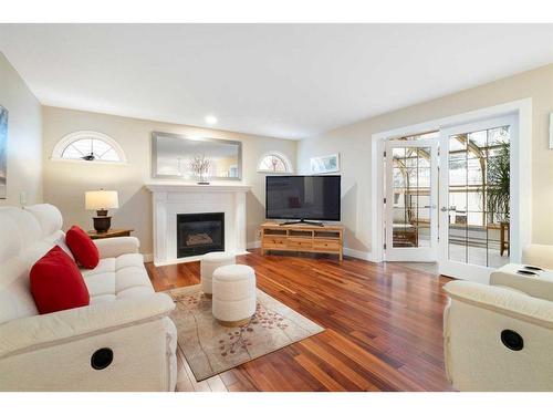 816 Diamond Court Se, Calgary, AB - Indoor Photo Showing Living Room With Fireplace