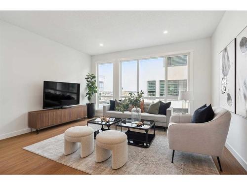 309-265 Sage Hill Rise Nw, Calgary, AB - Indoor Photo Showing Living Room