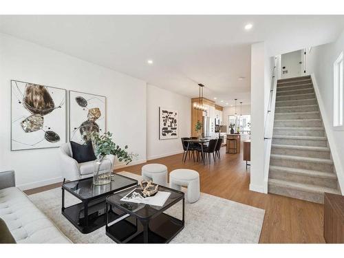 309-265 Sage Hill Rise Nw, Calgary, AB - Indoor Photo Showing Living Room