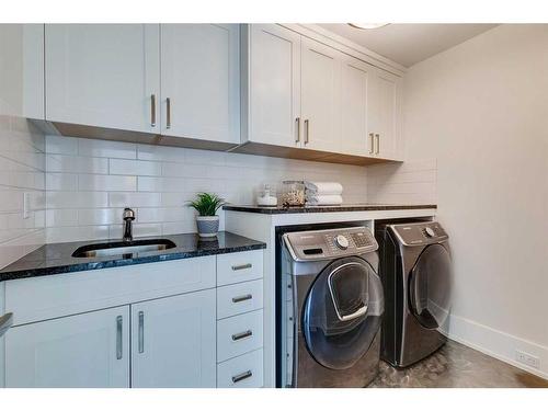 12 Discovery Valley Cove Sw, Calgary, AB - Indoor Photo Showing Laundry Room