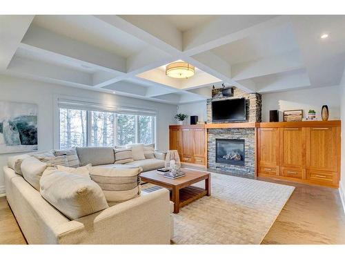 12 Discovery Valley Cove Sw, Calgary, AB - Indoor Photo Showing Living Room With Fireplace