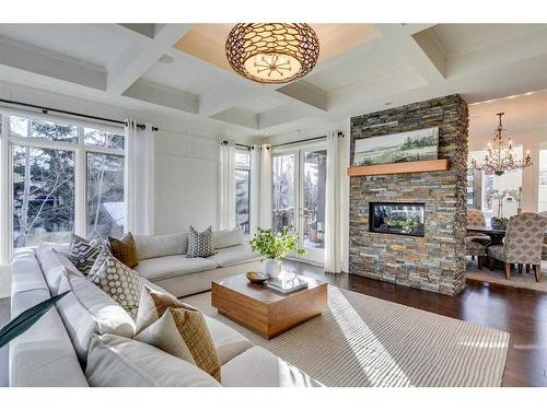 12 Discovery Valley Cove Sw, Calgary, AB - Indoor Photo Showing Living Room With Fireplace