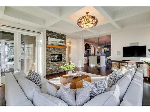 12 Discovery Valley Cove Sw, Calgary, AB - Indoor Photo Showing Living Room With Fireplace