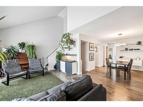 303-2423 56 Street Ne, Calgary, AB - Indoor Photo Showing Living Room