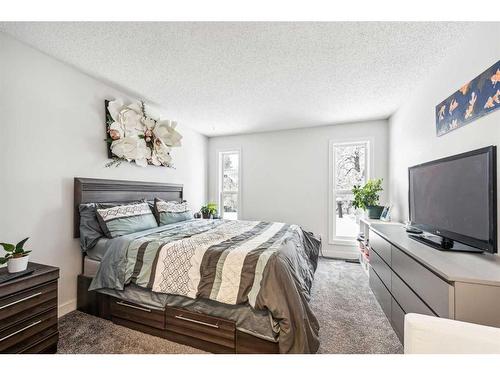 303-2423 56 Street Ne, Calgary, AB - Indoor Photo Showing Bedroom