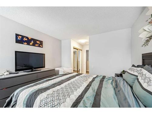 303-2423 56 Street Ne, Calgary, AB - Indoor Photo Showing Bedroom