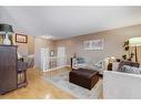 127 Bracewood Road Sw, Calgary, AB  - Indoor Photo Showing Living Room 