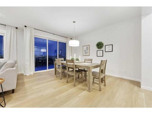 907 Langholm Drive Se, Airdrie, AB - Indoor Photo Showing Dining Room