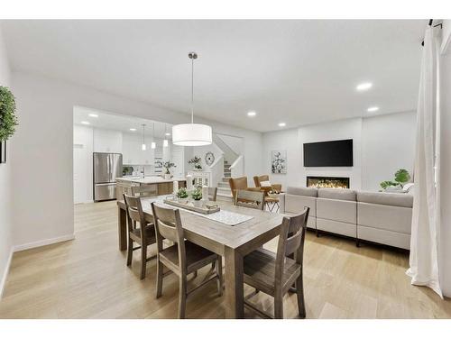 907 Langholm Drive Se, Airdrie, AB - Indoor Photo Showing Dining Room