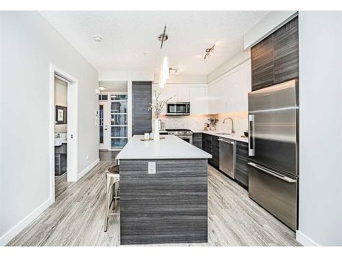 2403-95 Burma Star Road Sw, Calgary, AB - Indoor Photo Showing Kitchen With Stainless Steel Kitchen With Upgraded Kitchen