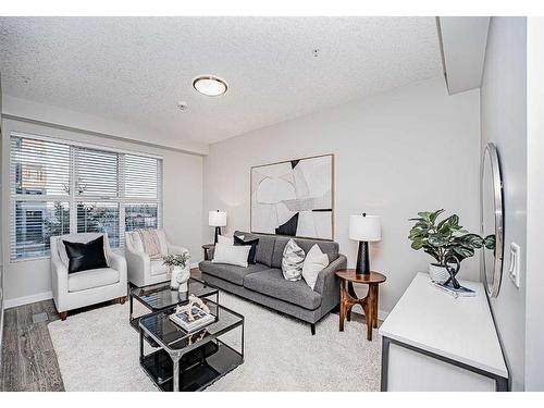 2403-95 Burma Star Road Sw, Calgary, AB - Indoor Photo Showing Living Room