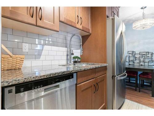 205-507 57 Avenue Sw, Calgary, AB - Indoor Photo Showing Kitchen With Stainless Steel Kitchen With Upgraded Kitchen