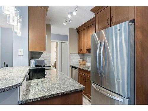 205-507 57 Avenue Sw, Calgary, AB - Indoor Photo Showing Kitchen With Stainless Steel Kitchen With Upgraded Kitchen