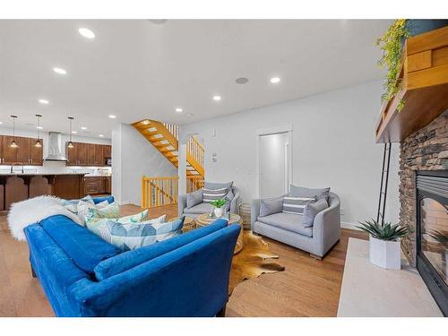 2035 37 Avenue Sw, Calgary, AB - Indoor Photo Showing Living Room With Fireplace