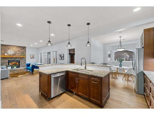 2035 37 Avenue Sw, Calgary, AB - Indoor Photo Showing Kitchen With Fireplace With Upgraded Kitchen