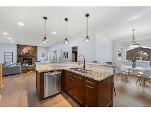 2035 37 Avenue Sw, Calgary, AB - Indoor Photo Showing Kitchen With Fireplace With Upgraded Kitchen