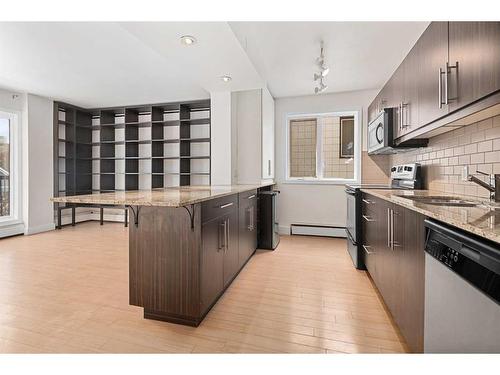 305-824 4 Avenue Nw, Calgary, AB - Indoor Photo Showing Kitchen