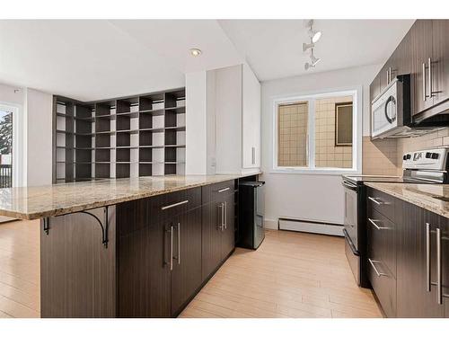 305-824 4 Avenue Nw, Calgary, AB - Indoor Photo Showing Kitchen