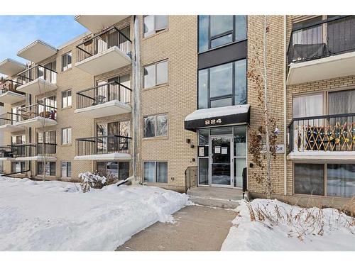 305-824 4 Avenue Nw, Calgary, AB - Outdoor With Balcony With Facade