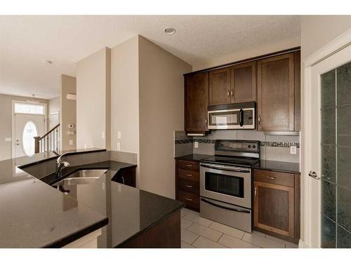 2-1617 27 Avenue Sw, Calgary, AB - Indoor Photo Showing Kitchen With Double Sink