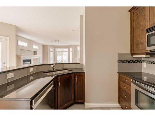 2-1617 27 Avenue Sw, Calgary, AB - Indoor Photo Showing Kitchen With Stainless Steel Kitchen With Double Sink