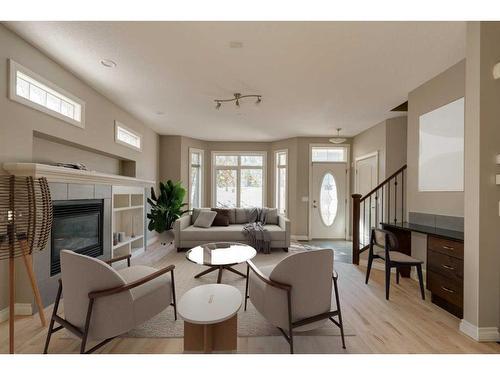 2-1617 27 Avenue Sw, Calgary, AB - Indoor Photo Showing Living Room With Fireplace