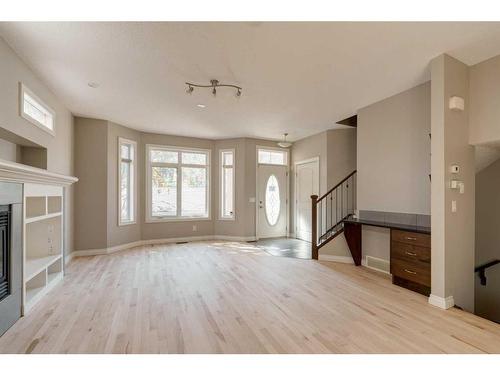 2-1617 27 Avenue Sw, Calgary, AB - Indoor Photo Showing Other Room With Fireplace