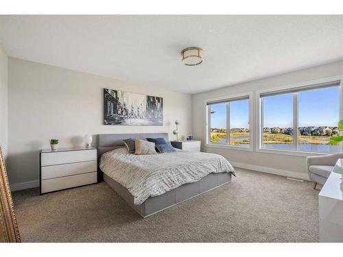 144 Marquis View Se, Calgary, AB - Indoor Photo Showing Bedroom