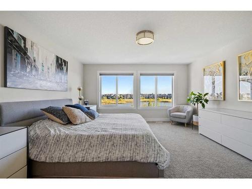 144 Marquis View Se, Calgary, AB - Indoor Photo Showing Bedroom