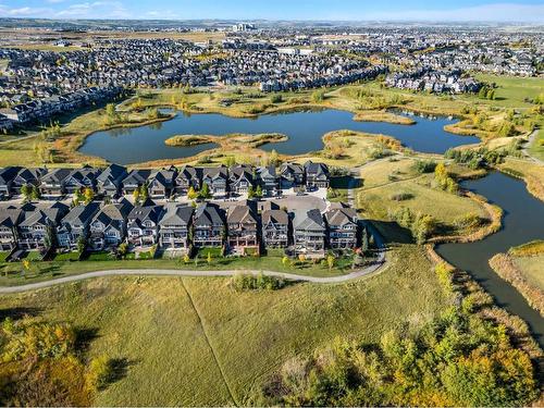 144 Marquis View Se, Calgary, AB - Outdoor With Body Of Water With View