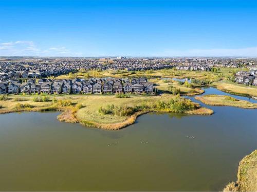 144 Marquis View Se, Calgary, AB - Outdoor With Body Of Water With View