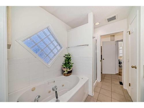 15 Prestwick Row Se, Calgary, AB - Indoor Photo Showing Bathroom