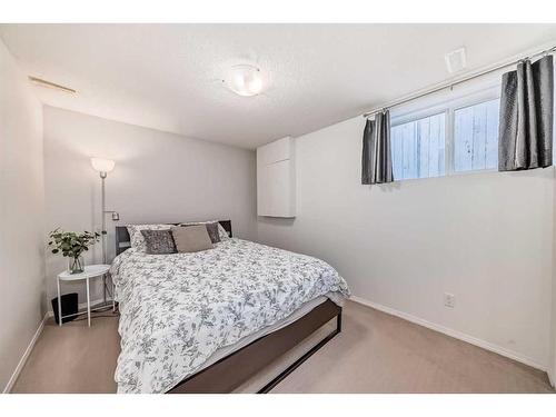 15 Prestwick Row Se, Calgary, AB - Indoor Photo Showing Bedroom